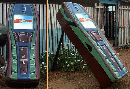 "Keep your line to heaven open - go to the afterlife in a Nokia," reads an African website that sells fantasy coffins. "The face of the phone opens to make the lid. Whatever brand you want our carpenters can make it for you - even blue tooth!" (Photo courtesy of eShopAfrica.com)