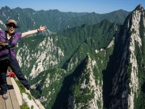 A hiker cheats death on the infamous trail at China's Huashan National Park. Across the US, summer is the time for visiting National Parks, where about six deaths occur every week.